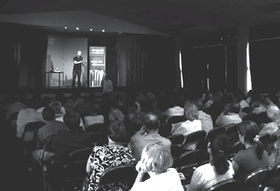 Photograph of Don Paterson reading on stage