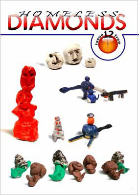 Photo of small sculptures of snails and other creatures.