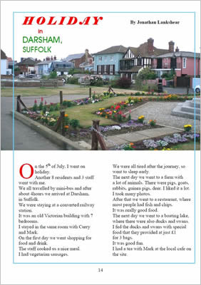 Photo of pretty gardens and flowers in Darsham in front of colourful houses.